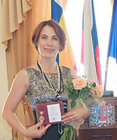 Елена Анатольевна Абраменко - хореограф, главный балетмейстер Ростовской государственной филармонии, солистка Государственного ансамбля донских казаков им. Квасова, Заслуженная артистка республики Дагестан - Ростов-на-Дону.